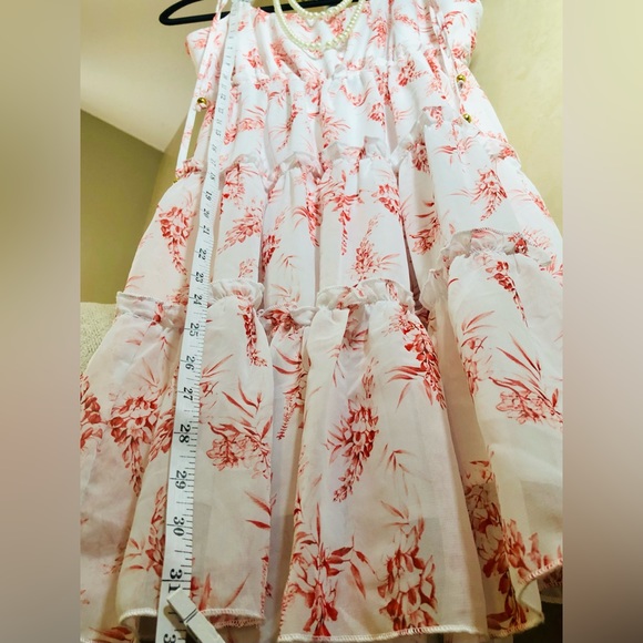 White dress with red detail. Adjustable tie straps with gold accent beads. - Picture 2 of 8